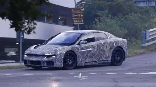 Ferrari Luce caught testing in Italy: camouflage couldn't hide the giant vertical wipers