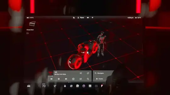 Tesla aggiorna l’infotainment: promo Tron divide gli utenti